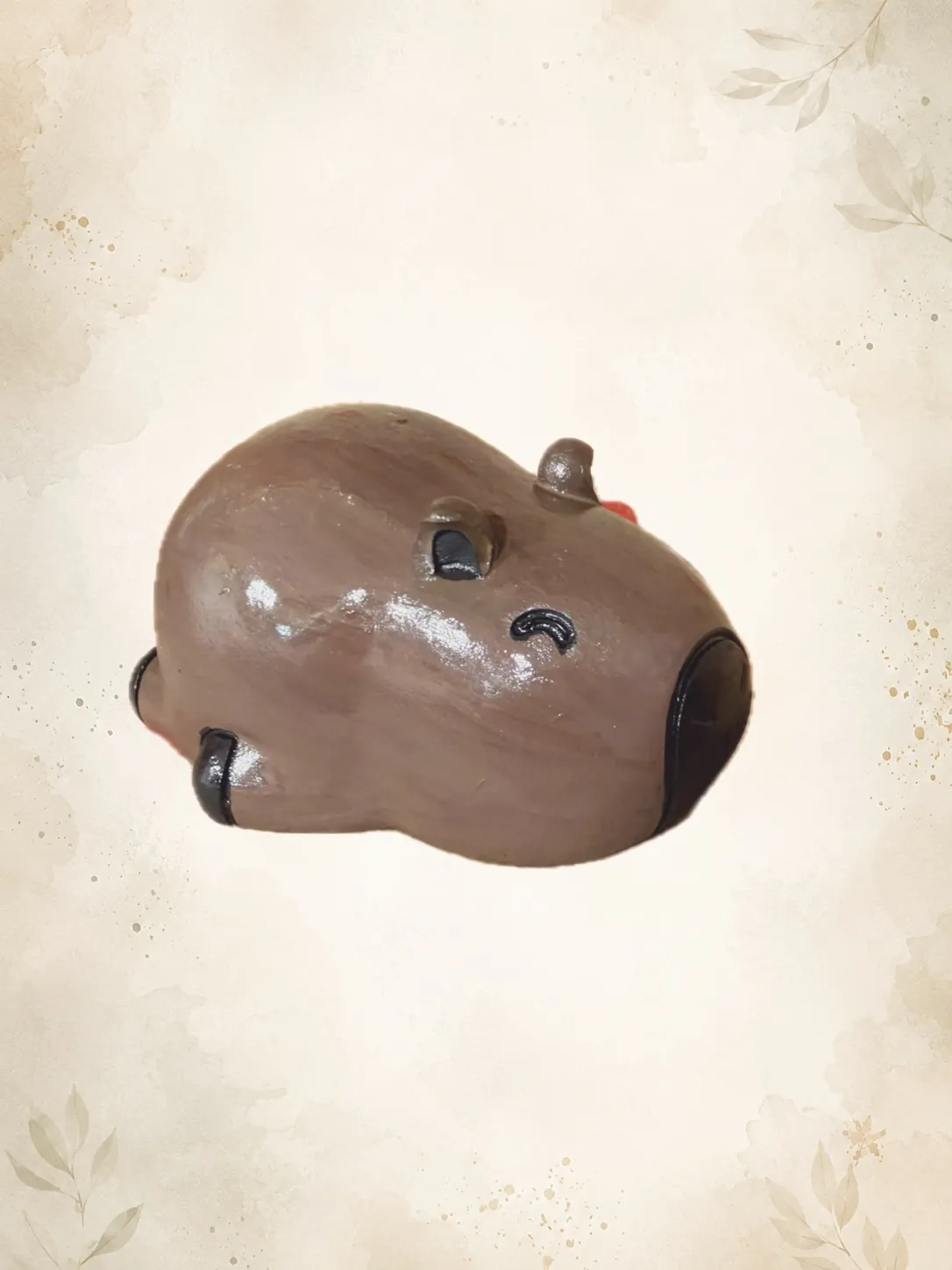 Figura de capibara en cerámica marrón