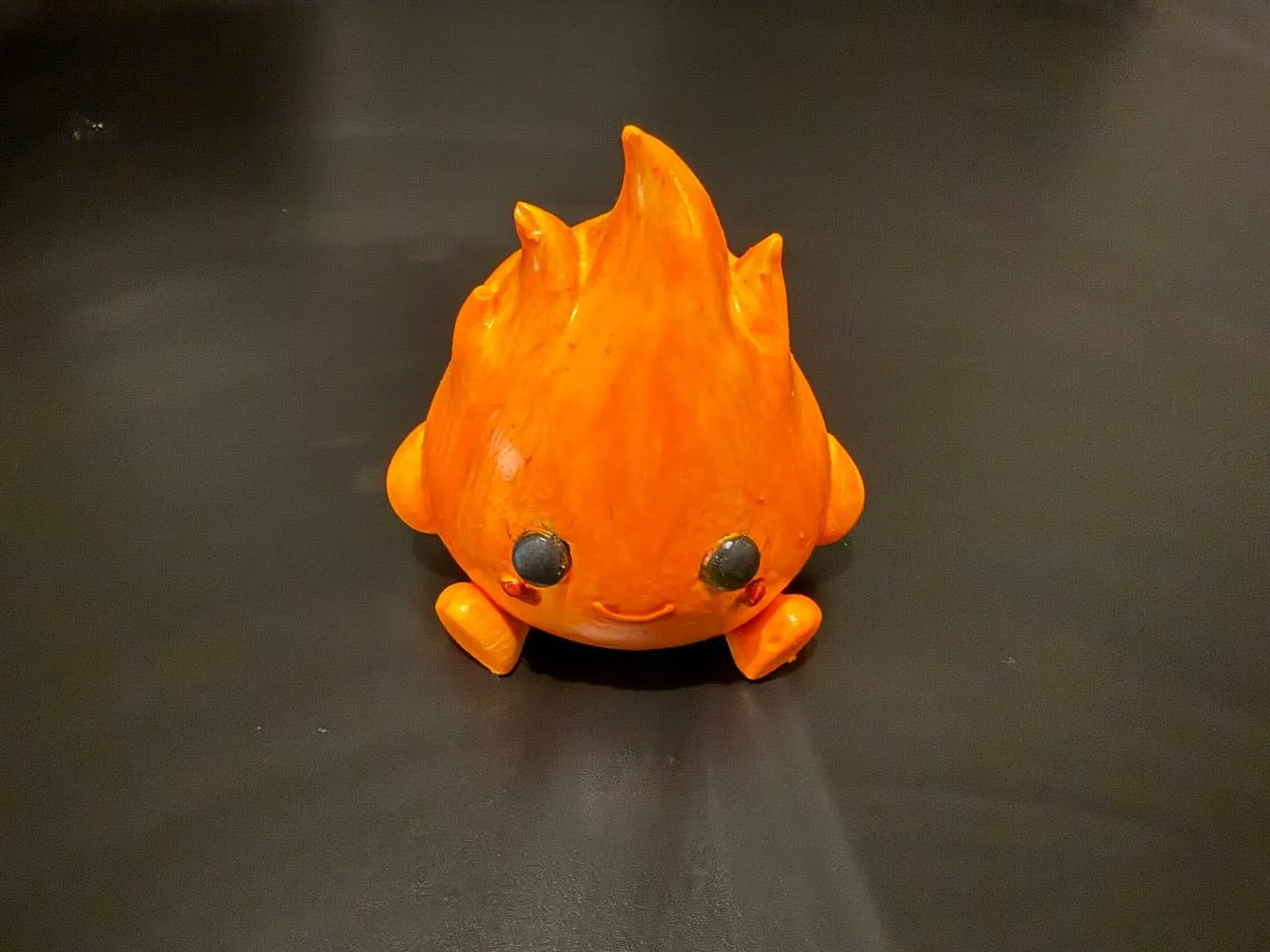 Figura de llamas artesanal en cerámica naranja